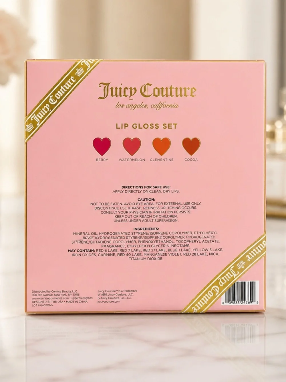 Juicy Couture 4-Piece Lip Gloss Set – Pink & Nude Shades